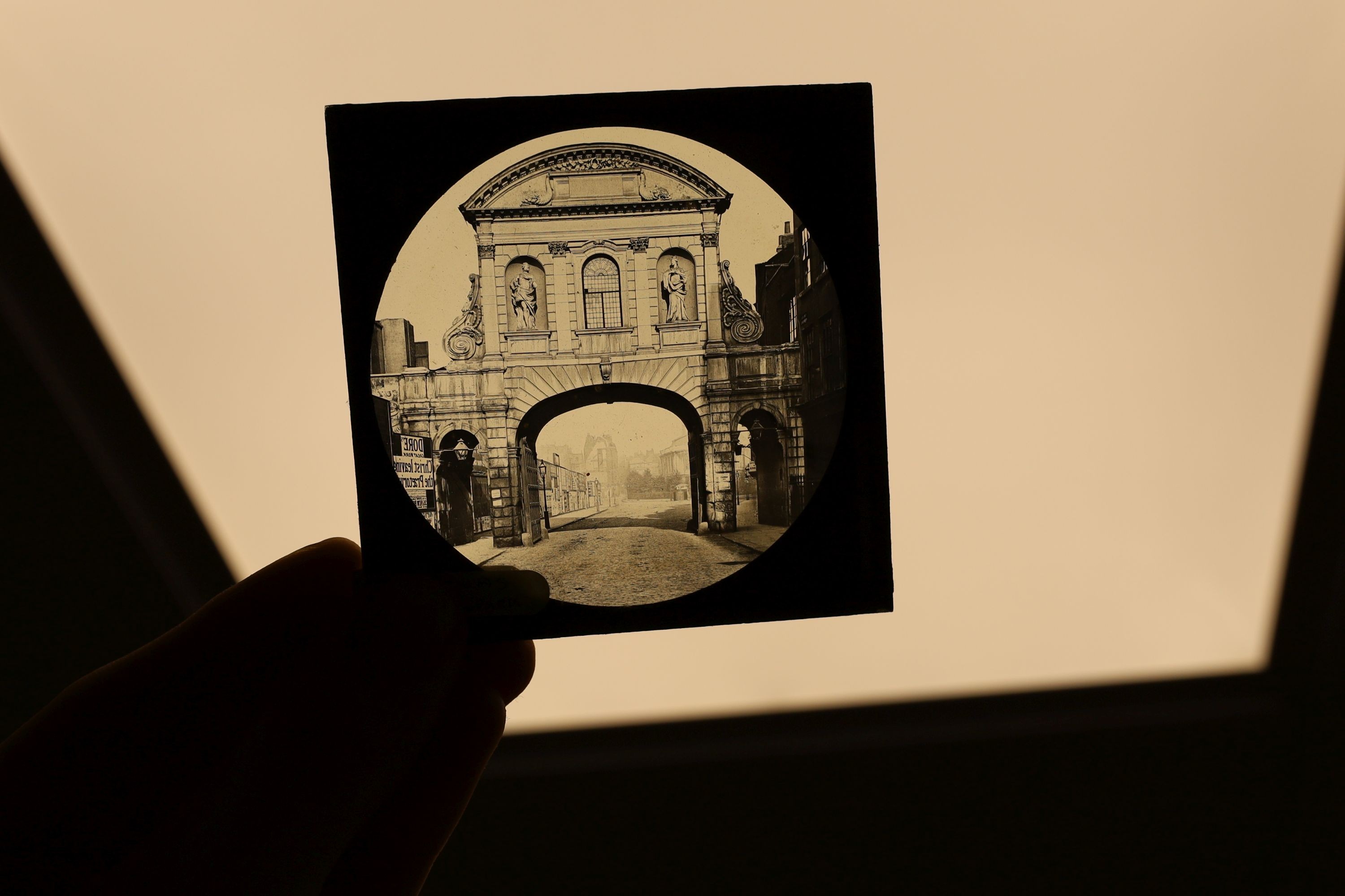 A late 19th century Magic lantern, cased with slides